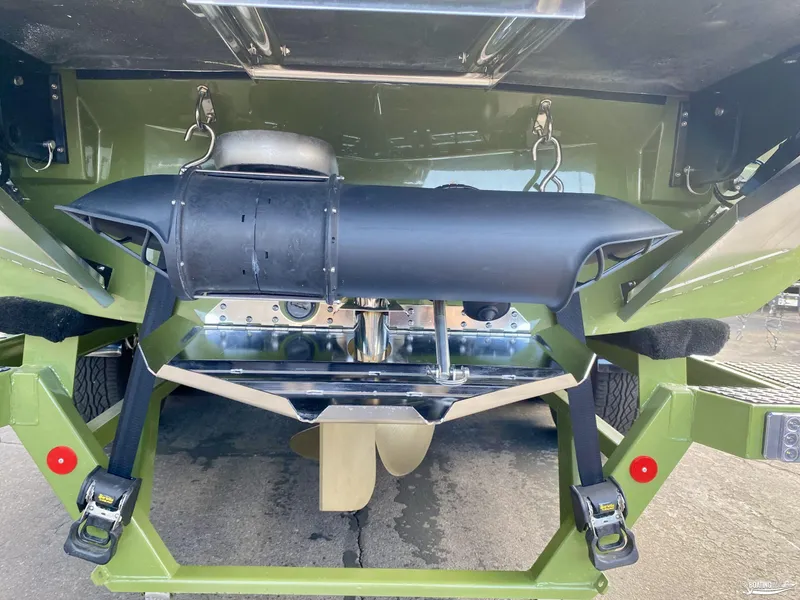 Slide: The Image of 2022 MasterCraft X26 boat trailer with propeller and exhaust system. - 5