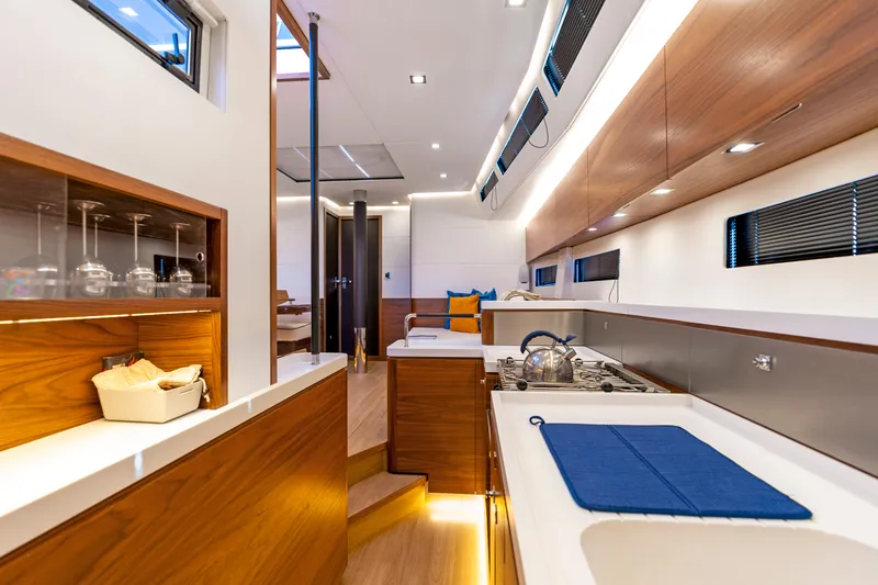 Slide: The Image of Interior of Amel 50 yacht, modern kitchen, 2019 model. - 12