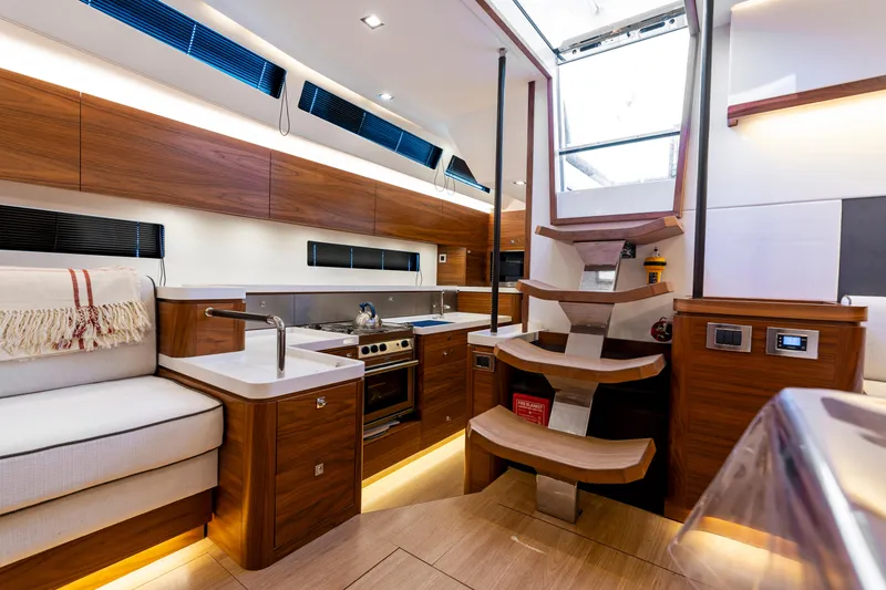 Slide: The Image of Interior of Amel 50 yacht, modern kitchen and stairs, 2019 model. - 17