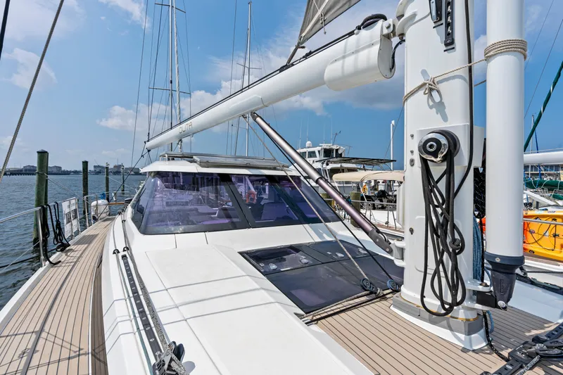 Slide: The Image of 2019 Amel 50 sailboat docked, side view. - 18