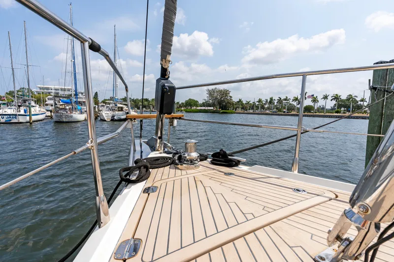 Slide: The Image of 2019 Amel 50 yacht docked in marina on sunny day. - 19