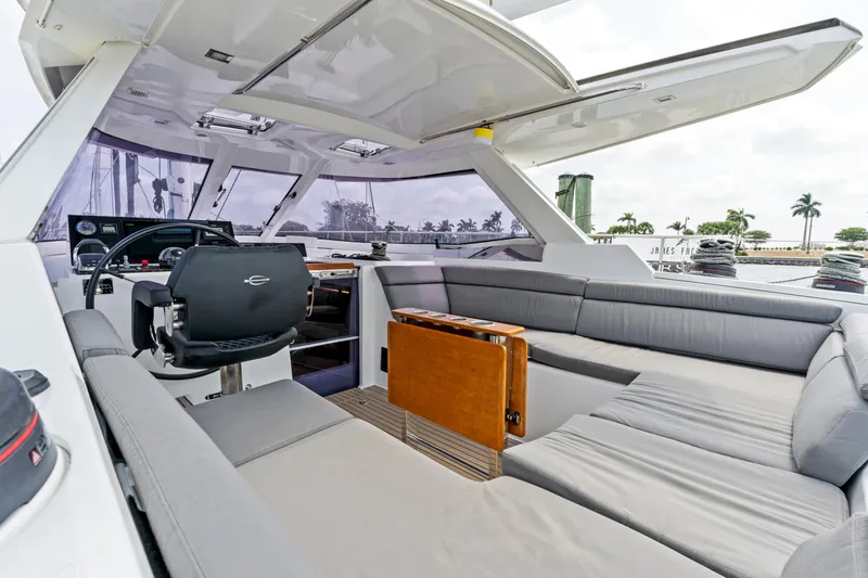 Slide: The Image of Interior of a 2019 Amel 50 yacht with gray seating. - 28