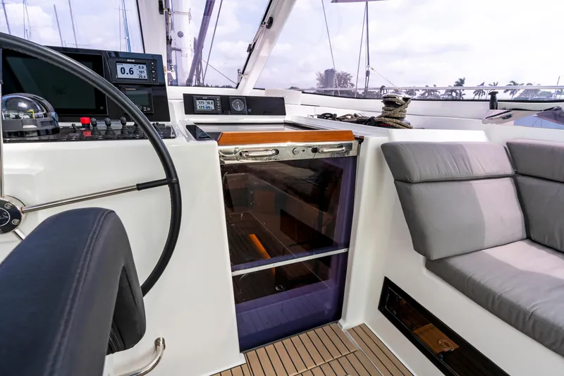 Slide: The Image of Interior of 2019 Amel 50 yacht with helm and seating area. - 31
