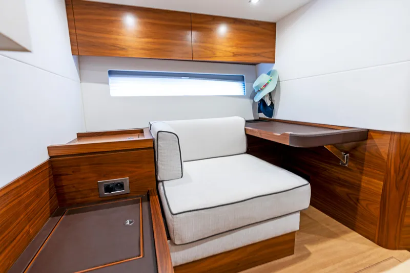Slide: The Image of Interior of 2019 Amel 50 yacht with elegant wood paneling. - 4