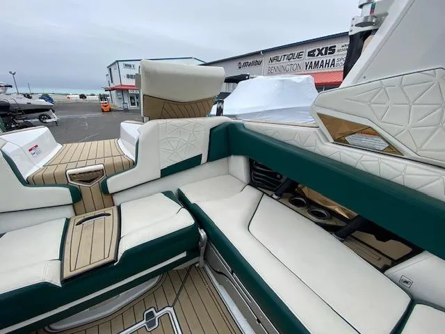 Slide: The Image of 2020 Nautique PARAGON 23 boat interior with luxurious seating and modern design. - 13