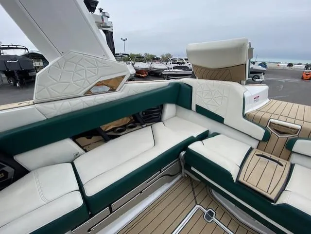 Slide: The Image of 2020 Nautique PARAGON 23 interior with luxurious seating and modern design. - 14