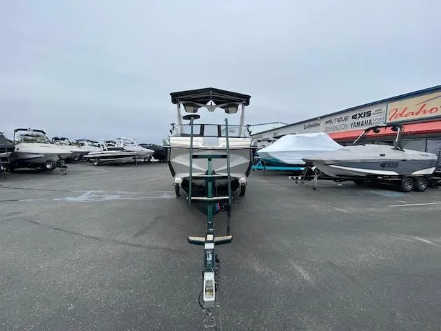 Slide: The Image of 2020 Nautique PARAGON 23 boat on trailer in a dealership lot. - 8