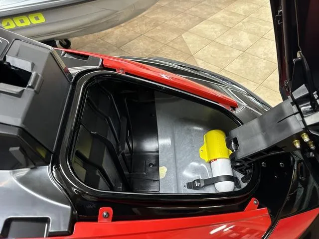 Slide: The Image of 2024 Yamaha WaveRunner VX Limited storage compartment with open lid. - 13