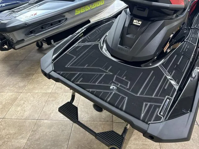 Slide: The Image of 2024 Yamaha WaveRunner VX Limited jet ski on display in showroom. - 14