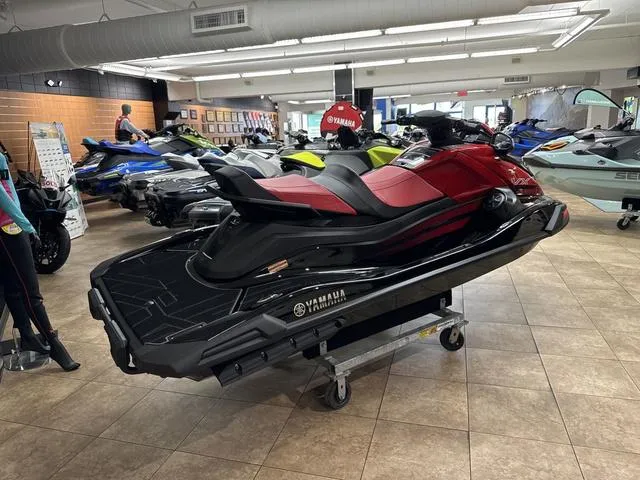 Slide: The Image of 2024 Yamaha WaveRunner VX Limited in showroom, sleek red and black design. - 4
