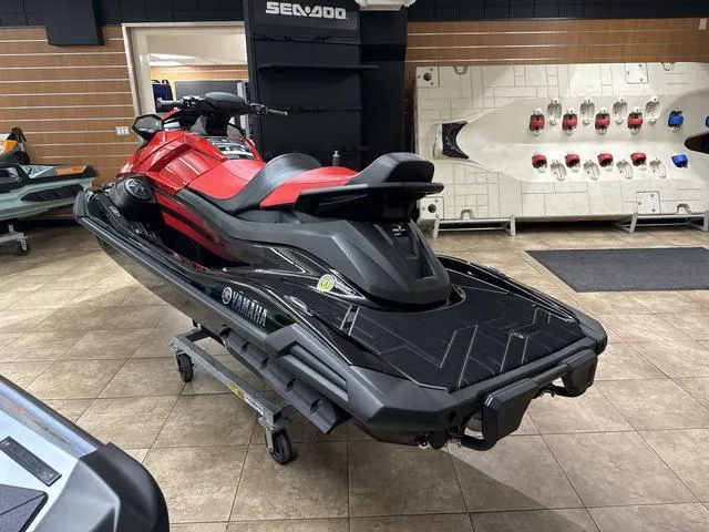 Slide: The Image of 2024 Yamaha WaveRunner VX Limited in showroom, red and black design. - 6