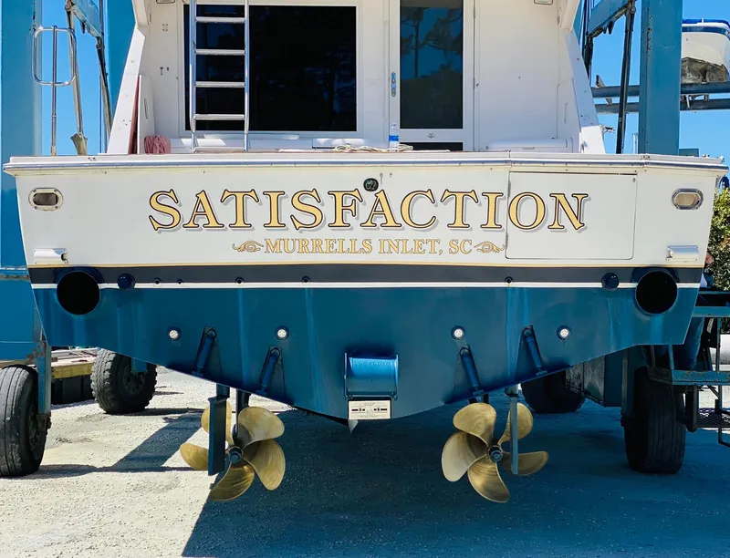 Slide: The Image of 1999 Bertram 60 Convertible boat named Satisfaction in Murrells Inlet, SC. - 5