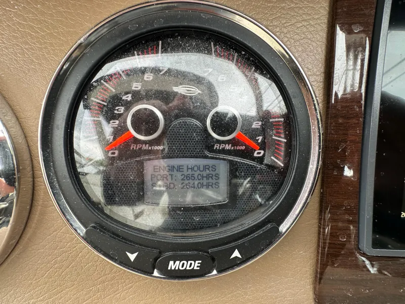 Slide: The Image of Close-up of 2014 Chaparral 307 SSX tachometer showing engine hours. - 14