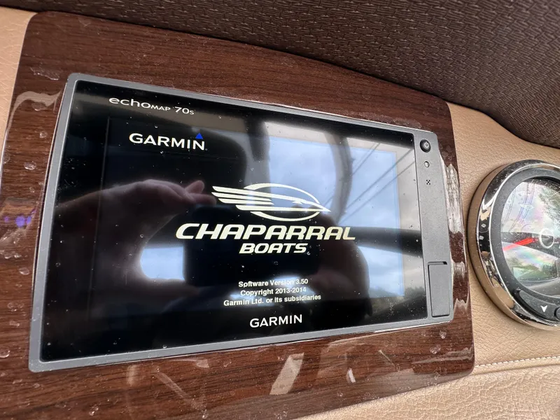Slide: The Image of Garmin echomap 70s display on 2014 Chaparral 307 SSX boat dashboard. - 36