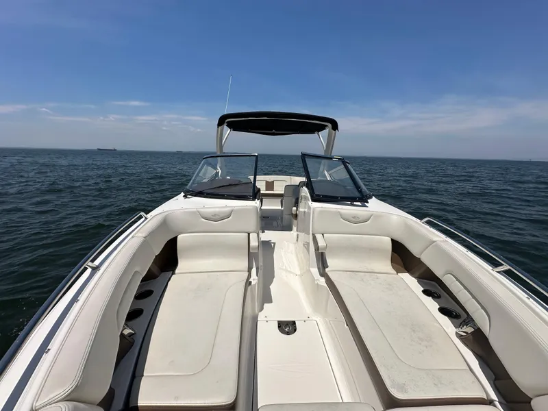 Slide: The Image of 2014 Chaparral 307 SSX boat interior with open water view. - 4