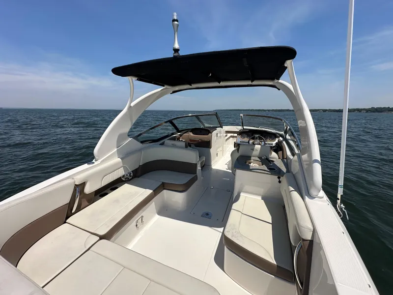 Slide: The Image of 2014 Chaparral 307 SSX boat interior on open water. - 5