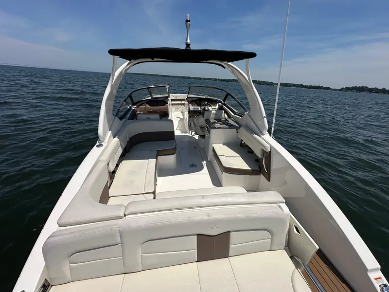 Slide: The Image of 2014 Chaparral 307 SSX boat interior on open water. - 6