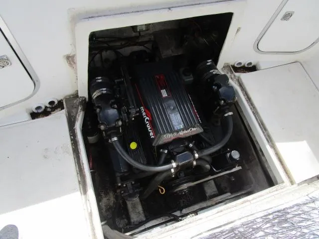 Slide: The Image of 1994 Bayliner 2452 Classic engine compartment with MerCruiser 5.0L Alpha One. - 16