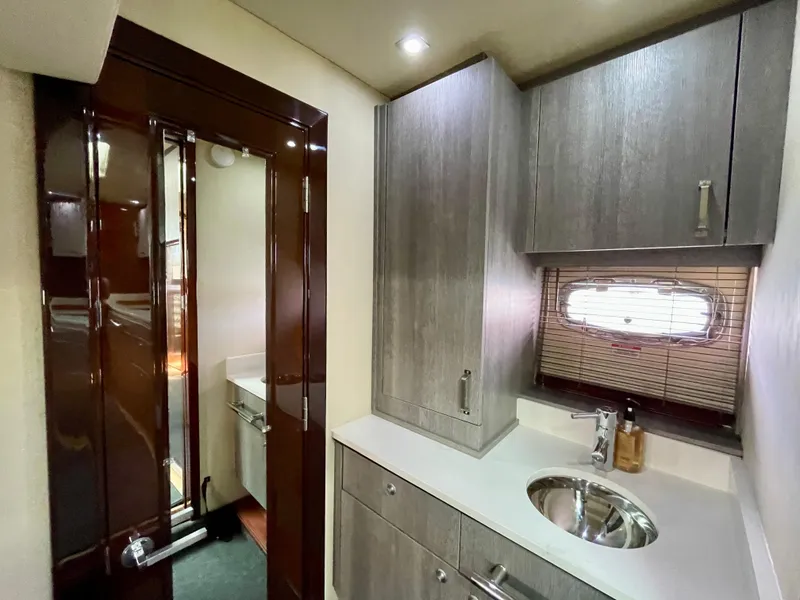 Slide: The Image of 2009 Sea Ray 470 Sundancer yacht interior with modern kitchenette and sink. - 39