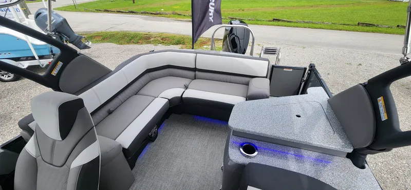 Slide: The Image of 2024 Avalon Windshield Catalina 2585 boat interior with luxurious seating and modern design. - 12