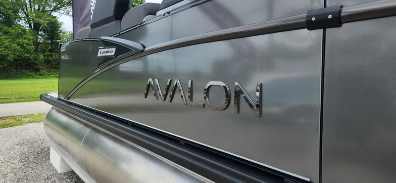 Slide: The Image of 2024 Avalon Windshield Catalina 2585 boat side view with logo. - 16