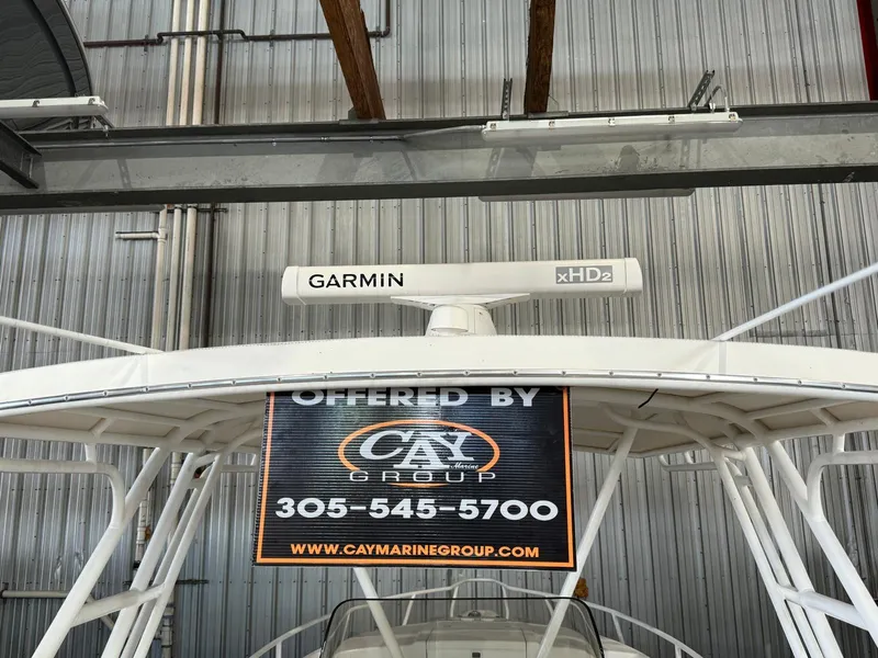 Slide: The Image of 2003 Intrepid 322 Cuddy with Garmin xHD2 radar, offered by Cay Marine Group. - 2