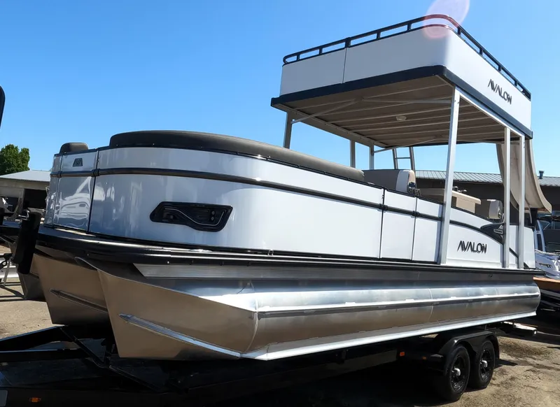 The Image of 2024 Avalon Catalina Entertainer Funship pontoon boat on trailer. - 0