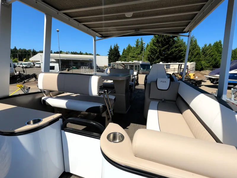 Slide: The Image of 2024 Avalon Catalina Entertainer Funship pontoon boat with spacious seating and modern design. - 19
