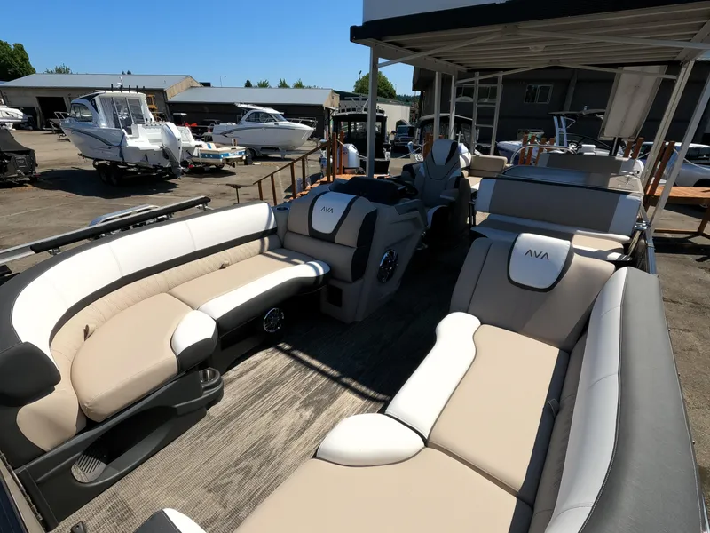 Slide: The Image of 2024 Avalon Catalina Entertainer Funship with luxurious seating at a marina. - 9