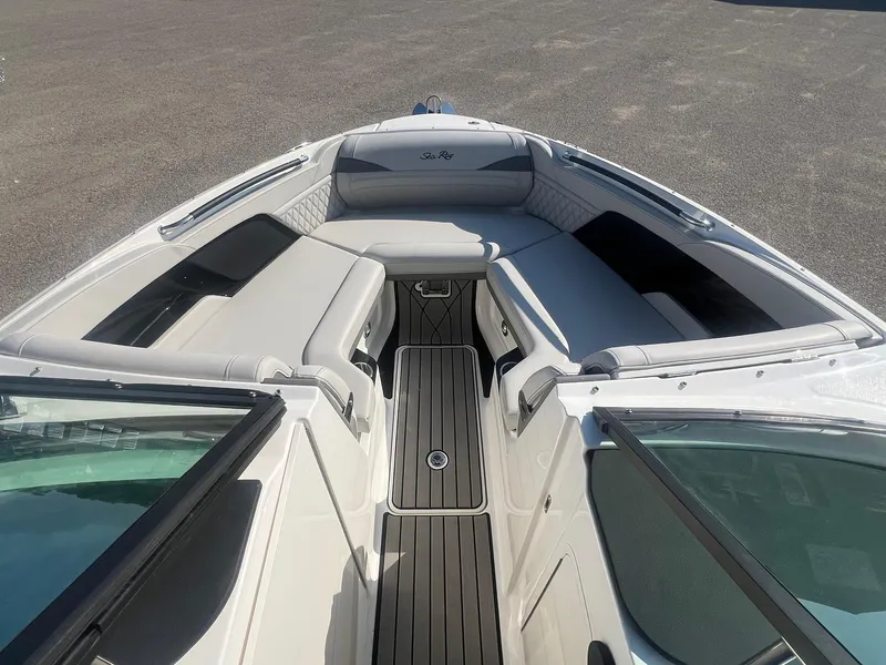 Slide: The Image of 2024 Sea Ray SLX 260 Outboard boat interior with sleek seating and modern design. - 14