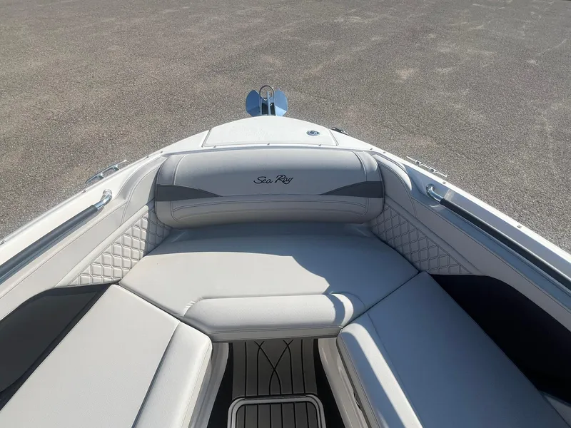 Slide: The Image of 2024 Sea Ray SLX 260 Outboard boat interior with luxurious seating. - 15