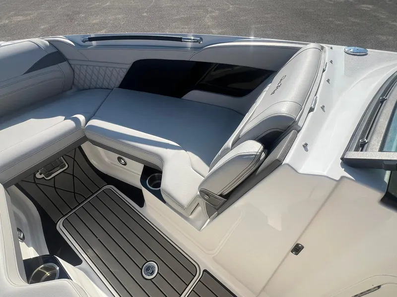 Slide: The Image of 2024 Sea Ray SLX 260 Outboard interior with luxurious seating and sleek design. - 16