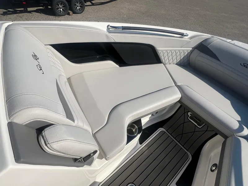 Slide: The Image of 2024 Sea Ray SLX 260 Outboard interior with luxurious seating and sleek design. - 17