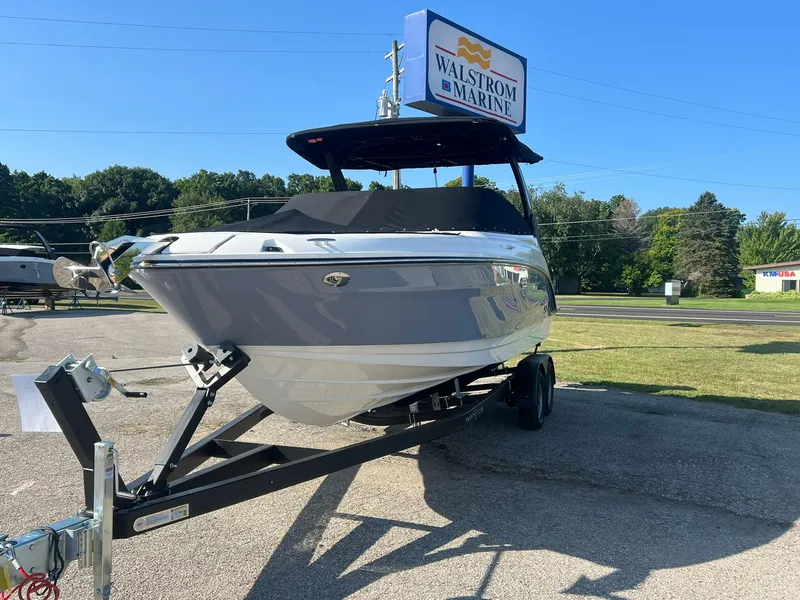 Slide: The Image of 2024 Sea Ray SLX 260 Outboard boat on trailer at Walstrom Marine dealership. - 19