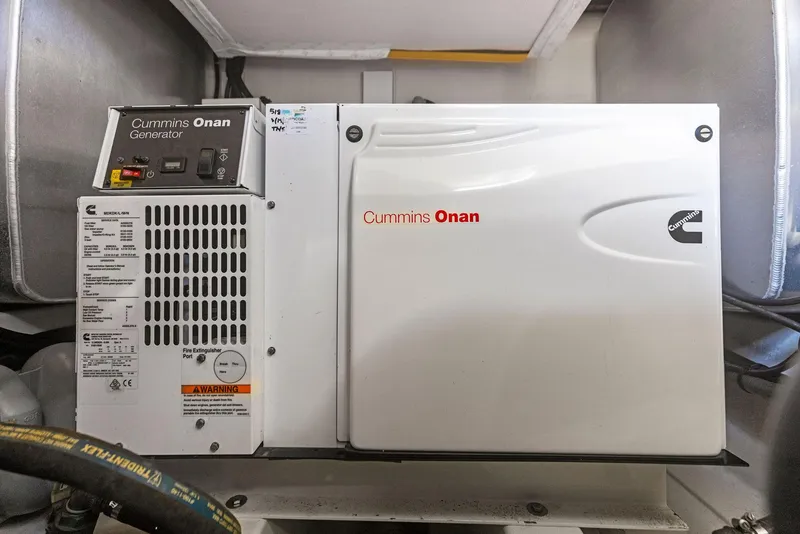 Slide: The Image of Cummins Onan generator in a 2018 Prestige 460 yacht engine room. - 20