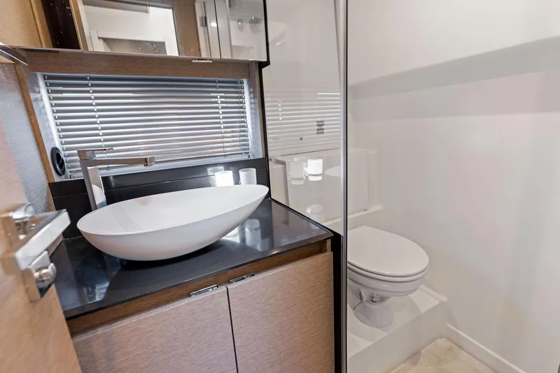 Slide: The Image of Modern bathroom in 2018 Prestige 460 yacht with vessel sink and toilet. - 35