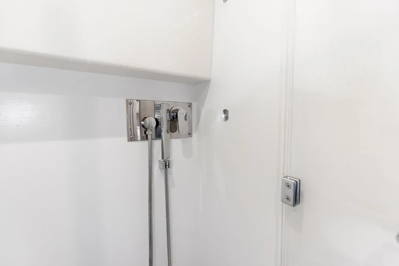 Slide: The Image of Shower area in 2018 Prestige 460 yacht with chrome fixtures. - 36