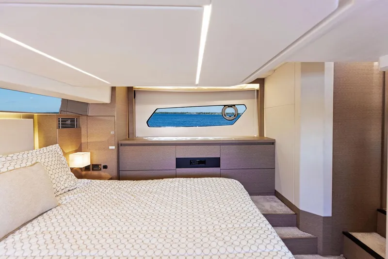 Slide: The Image of Luxurious bedroom interior of 2018 Prestige 460 yacht with modern design and ocean view. - 38