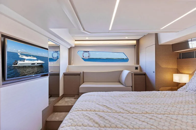Slide: The Image of Luxurious bedroom interior of 2018 Prestige 460 yacht with ocean view and modern amenities. - 40
