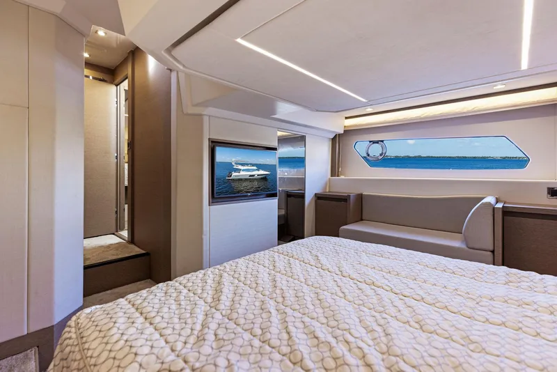Slide: The Image of Luxurious bedroom interior of 2018 Prestige 460 yacht with ocean view. - 41