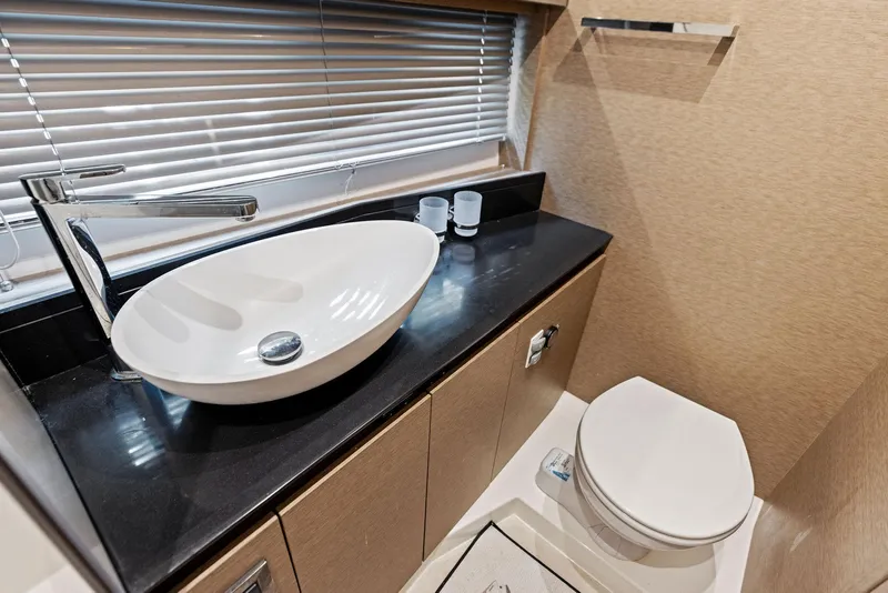 Slide: The Image of Modern bathroom in 2018 Prestige 460 yacht with sleek sink and toilet. - 43