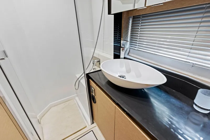 Slide: The Image of Modern bathroom in 2018 Prestige 460 yacht with vessel sink and shower. - 44