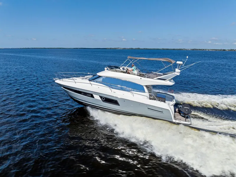 Slide: The Image of Prestige 460 yacht cruising on open water, 2018 model. - 9