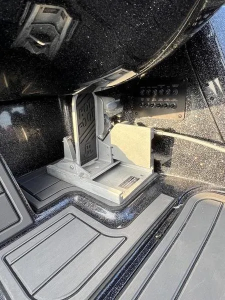 Slide: The Image of 2024 Phoenix 20 XE boat interior with Hot Foot throttle and control panel. - 25