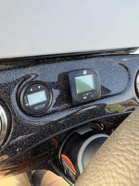 Slide: The Image of Dashboard of 2024 Phoenix 20 XE boat with digital displays. - 28