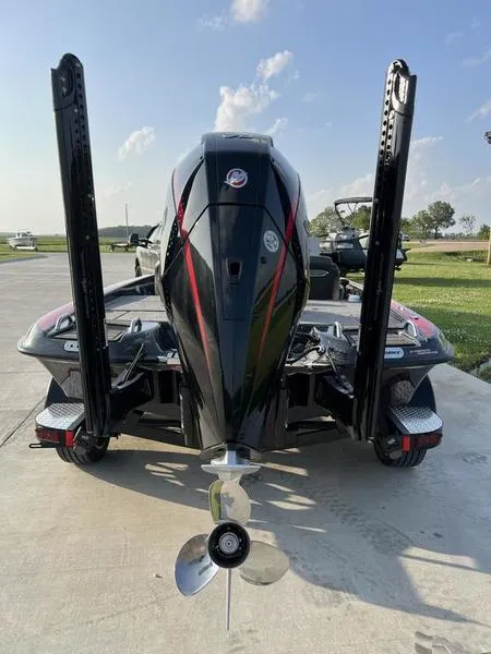 Slide: The Image of 2024 Phoenix 20 XE boat with dual power poles and outboard motor. - 4