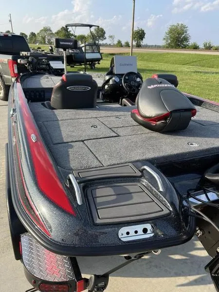 Slide: The Image of 2024 Phoenix 20 XE fishing boat with modern features and spacious deck. - 6