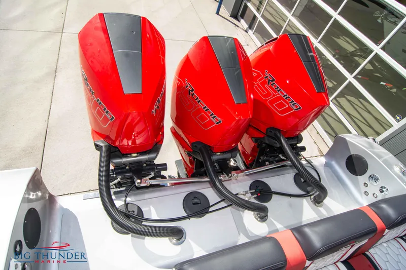 Slide: The Image of Triple Mercury Racing 450R outboard engines on a 2021 Fountain 38 SC boat. - 16