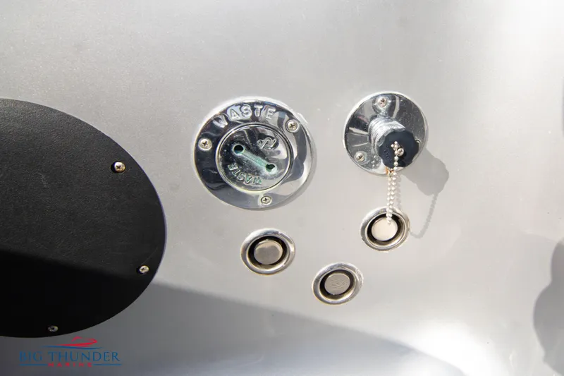 Slide: The Image of Close-up of waste disposal and fuel cap on 2021 Fountain 38 SC boat. - 17