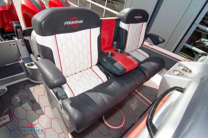 Slide: The Image of 2021 Fountain 38 SC boat seats with cup holders and stylish upholstery. - 28